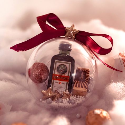 Jagermeister Christmas transparent ball Christmas Ball Gift Ideas, Christmas Ball Ornament Drinks, Mini Liquor Bottle Gift Ideas Christmas, Christmas Candy Dome Ornaments, Filled Baubles Gifts, Transparent Christmas Balls, Frosted Garland, Christmas Gift Hampers, Book Christmas Gift