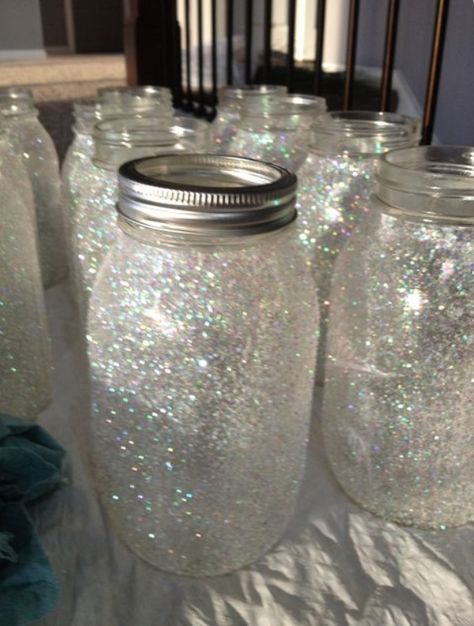 We could put blue ribbons around this....Cute mason jars for a wedding Jar Wedding Centerpieces, Mason Jar Wedding Centerpieces, Wedding Centerpieces Mason Jars, Glitter Mason Jars, Mason Jar Wedding, Mason Jar Centerpieces, Mason Jar Crafts, Wedding Wishes, Jar Crafts