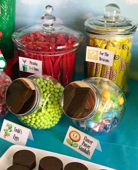 Luke’s Super Mario Birthday  | CatchMyParty.com Mario Candy Table Ideas, Super Mario Bros Candy Table, Mario Treat Table, Super Mario Candy Table, Mario Birthday Party Ideas, Birthday Candy Table, Super Mario Bros Party, Video Games Birthday Party, Mario Bros Birthday