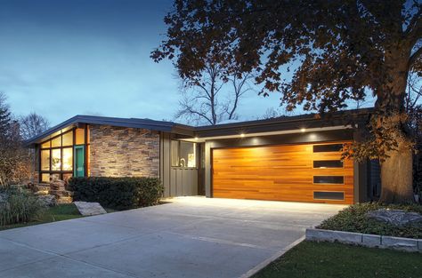 Midcentury Renovation in Wisconsin Delights Original Owners Mid Century Renovation, Smart Home Automation Systems, Walnut Hardwood Flooring, Mcm Home, Wood Garage, Cedar Posts, Wood Garage Doors, Solar Panels Roof, Modernist Architects