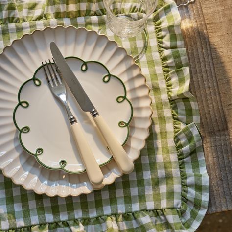 These Gingham Ruffle Placemats bring a chic easter look to your table this Spring. Pair with our matching Spring Green Gingham Tablecloth. Size: 40x40cm Care: Cold wash Milk Glass Table Setting, Mismatched Dishes Table Settings, Vintage Spring Tablescapes, Cute Table Setting, Green Gingham Tablecloth, Summer Table Scape, Mismatched China Table Setting, Cute Placemats, Outdoor Lunch Table Setting