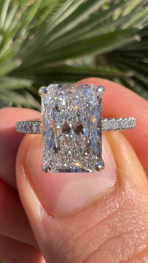 Radiating love and luminance, our 3-carat radiant engagement ring steals the spotlight. Say ‘yes’ to everlasting elegance! 💫💍 | Instagram Rings Engagement Big Diamonds, 3 Carat Rectangle Engagement Ring, 5 Carrot Wedding Ring, Cushion Radiant Engagement Ring, Wedding Ring Radiant Cut, Elegant Wedding Rings Engagement, 5 Carat Radiant Engagement Ring, Radient Engagement Ring, 2 Carat Radiant Engagement Ring