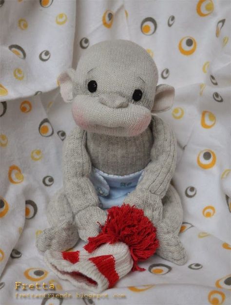 Here is another way to make a sock monkey. I'm giving you some hints. Employ your creativity. Sock Monkeys Tutorial, Sock Monkey Pattern, Crochet Sock Monkeys, Sock Animals Patterns, Sock Monkey Dolls, Sock Monkey Baby, Newborn Socks, Monkey Pattern, Sock Doll