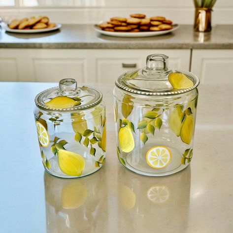 Painted gallon cookie jar lemons, lemon themed candle holder kitchen table decor, summer wedding gift, pretty  laundry detergent dish Kitchen Lemon Theme, Lemon Kitchen Decor Ideas, Lemon Themed Kitchen, Painted Lemons, Glass Jars Diy, Large Flower Vases, Jars Diy, Lemon Kitchen Decor, Gallon Jars