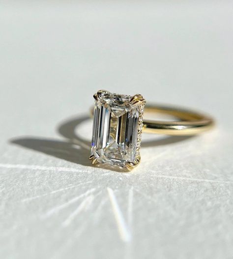 14k Solid Yellow Gold Engagement Ring 3.42 TC Elongated Emerald Cut Moissanite Wedding Ring Handmade Hidden Halo 4 Double Claws Trend Setter ❤ ITEM DETAILS:- ✦ Brand: The American Gold House (TAGH) ✦ Handmade, high-quality item! ✦ Material: Solid 10K/14K/18K Gold, 950 Platinum and 925 Sterling Silver ✦ Diamond Type: Moissanite Diamond ✦ Diamond Cut: 7x10 MM Elongated Emerald ✦ Diamond Weight: 3.21 CT ✦ Main Stone Color: Colorless ✦ Width of Band: 1.8 MM (Bottom) ✦ Diamond Clarity: VVS/VS ❤ ACCEN 3.5 Emerald Engagement Ring, Emerald Gold Wedding Rings, Hidden Halo Engagement Ring Emerald, Wedding Rings Engagement Radiant, Double Prong Emerald Cut Engagement Ring, Emerald Cut With Hidden Halo, Engagement Rings Emerald Cut Halo, Emerald Cut Engagement Ring Hidden Halo, Hidden Halo Emerald Engagement Ring