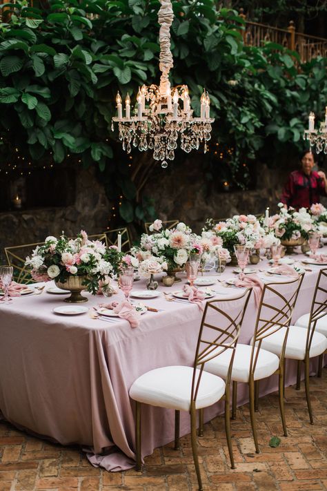 We are obsessed with this romantic wedding tucked away in one of Maui's hidden gems. This Hawaiian wedding venue, with glamorous hanging chandeliers, is a little slice of heaven and when the bride added hues of mauve, our hearts skipped a beat. Royal Blue And Light Pink Wedding Theme, Pink Forest Wedding, Pink Glam Wedding, Romantic Tablescape, Haiku Mill Wedding, Coastal Weddings, Shades Of Mauve, Haiku Mill, Blush Wedding Decor