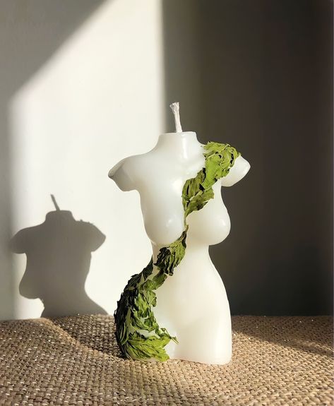 white body candle 10cm tall and 5cm wide decorated across the body with green mint leaves Torso Candle, Body Candles, Unique Sofa, Body Candle, Homemade Scented Candles, Soya Mumu, Candle Making Business, Candles Photography, Aesthetic Candles