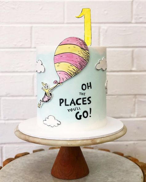 Pastel and Bloom on Instagram: “Dr. Seuss’ Oh the places you’ll go ! 💕 #cake #event #drsuessexperience” Dr Suess Cakes, Dr Seuss Cake, Dr Seuss Party Ideas, Apple Cake Pops, Book Cakes, Pastel Cakes, Seuss Party, Dr Seuss Birthday, Fondant Baby