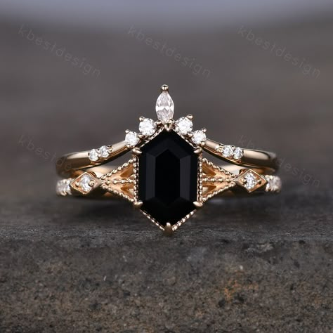 Elongated Hexagon cut Black Onyx Ring Antique Solid Yellow Gold Rings Vintage Black Stone Engagement Ring Unique Moissanite Wedding Ring Set. Unique long hexagon shaped ring, wedding ring, promise ring, anniversary gift. --Engagement Ring-- Main Stone: 9x5mm hexagon cut black onyx. Side stone: Moissanite --Wedding Band-- Curved Moissanite This ring is marked S925/G10K/G14K (According to the metal option) I accept custom making order.Please contact me if you need this service. For all the jewelri Punk Engagement Rings, Black Sapphire Engagement Ring, Black Engagement Ring Vintage, Black And Gold Engagement Ring, Gothic Ring, Black Stone Engagement Ring, Black Diamond Engagement Ring, Edgy Engagement Ring, Dark Engagement Ring