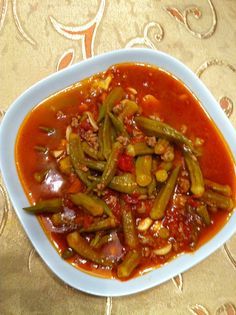 okra  bamieh  | Middle Eastern Food. My mom makes this a lot!! Arabisk Mad, Kurdish Food, Okra Stew, Syrian Food, Middle East Food, Middle East Recipes, Iraqi Food, Arabian Food, Armenian Recipes