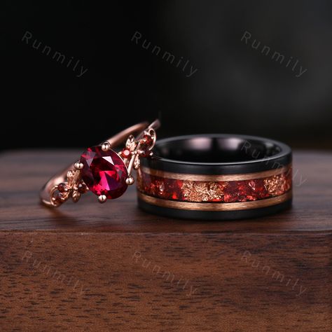 Here we have a Oval cut Ruby couples ring set rose gold matching promise ring His and Her wedding band Mens gold leaf tungsten ring anniversary gifts ITEM DESCRIPTION ✦ Handmade, high-quality item! ✦ Material: Sterling Silver/Solid Gold/Tungsten ►Sold as a two-piece set ►His ring is Black Tungsten Carbide with rose gold leaf and ruby inlay. ►His band width: 8mm ►His tungsten ring will not turn green itself and will not cause your skin to turn green.  ✦ Durable - Incredibly Scratch-Resistant to a Ruby Ring For Men Unique, Garnet Engagement Ring Men, Ruby Engagement Ring Men, Wedding Rings Him And Her, Ruby Wedding Rings Men, Garnet Wedding Band Men, Fantasy Wedding Ring Set, Wedding Rings Gothic, Non Traditional Wedding Rings Men