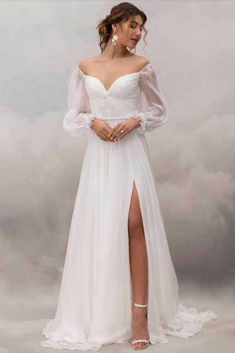 The Romantic wedding style whispers of elegance, femininity, and a touch of ethereal beauty, perfect for the bride who desires a timeless and captivating look on her special day. If you are looking for a softer whimsical look, you are definitely a romantic bride. Discover a range of romantic styles from Catherine Deane. Long Sleeve Sheer Wedding Dress, Non Traditional Wedding Dresses, Dress Upcycle, Wedding Dress Aesthetic, Romantic Wedding Style, Rembo Styling, Catherine Deane, Forest Theme Wedding, Fairy Tale Wedding Dress