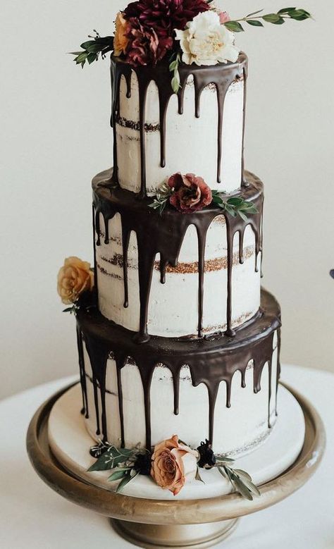 a fantastic three tier naked wedding cake with chocolate drip, blooms, greenery is a gorgeous idea for many weddings Vintage Pasta, Green Wedding Cake, Cake With Flowers, Pretty Wedding Cakes, Fondant Wedding Cakes, Wedding Cake Pictures, Wedding Cake Ideas, Wedding Cake Recipe, Wedding Cake Flavors