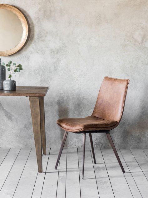 10 Best contemporary dining chairs | Real Homes Brown Dining Chairs, Faux Leather Chair, Industrial Dining Chairs, Brown Chair, Faux Leather Dining Chairs, Contemporary Dining Chairs, Computer Chair, Leather Dining, Modern Dining Chairs