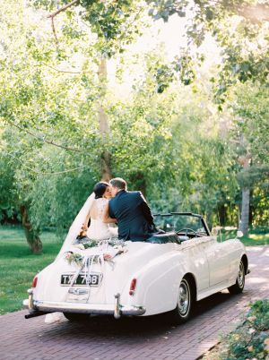 Photography: Jacque Lynn Photography l Floral, Wedding Planning, and Event Design:La Fete | Venue: La Caille l Gown: Marghera by Ines Di Santo from Dimitra’s Bridal Couture Chicago Classic Car Wedding, Wedding Getaway Car, Salt Lake City Wedding, Vintage Car Wedding, Wedding Exits, Convertible Car, Floral Event Design, Getaway Car, The Vineyard