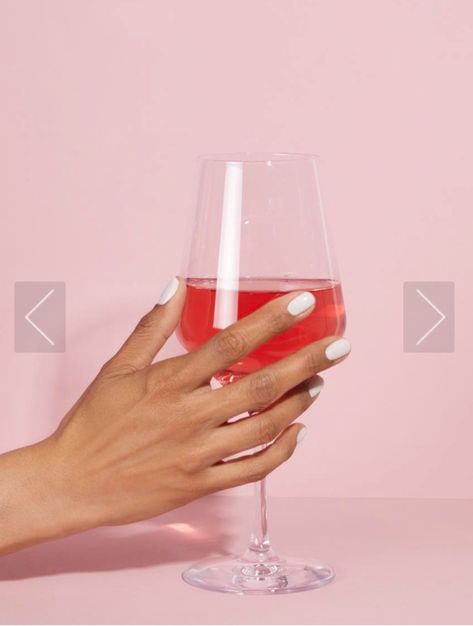 Hand holding a glass of red liquid Model Face Poses With Hands, Model Hand Poses Faces, Hand Model Portfolio, Hand Modelling Poses, Hand Model, Model Poses