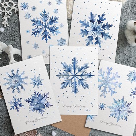 A beautiful snowflake themed watercolour set of 5 Folded Christmas Greeting Cards printed on luxury hammered cardstock with Envelopes.  Purchasing options: -set of 5 (1 card each of 5 different designs + 5 envelopes) -set of 10 (2 cards each of 5 different designs + 10 envelopes) The cards can be purchased in one size: A6 size - 148 x 105mm (5-7/8 in x 4-1/8) (when folded) Each card is printed on high quality thick 300gsm white hammered cardstock and comes with a 100gsm envelope of chosen colour Winter Card Design, Blue Christmas Cards Handmade, Seasonal Greetings Card, Christmas Watercolour Card, Christmas Card Snowflake, Watercolor Winter Cards, Watercolor Snowflake Art, Christmas Cards Snowflakes, Watercolor Xmas Cards