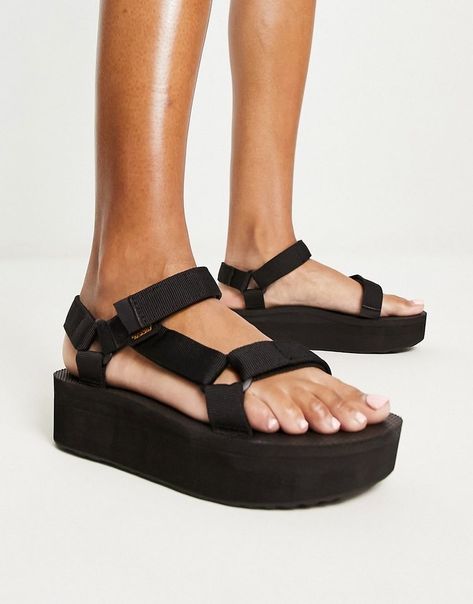 Black platform Tevas are the ultimate summer staple. They add a touch of style to any outfit and are so comfy. Platform Tevas, Platform Teva, Teva Platform, Teva Flatform, Flatform Sandals, Chunky Sandals, Trainer Heels, Shea Moisture Products, White Trainers