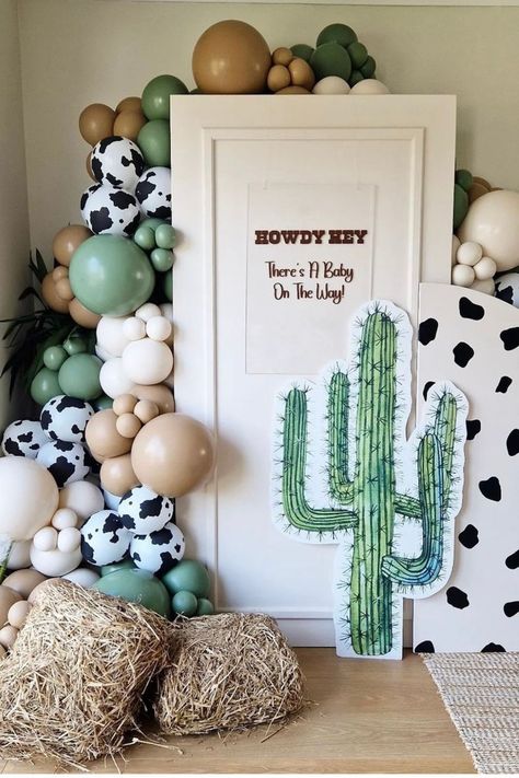 Yee-hah! This has got to be one of our favorite ways to round up these baby shower ideas for twins. This color scheme is super fun with the addition of the cow print and it brings a gorgeous and fun element to a baby shower.  Go one step further and get your guests to dress the part too! Cows Baby Shower Theme, A Little Cowgirl Is On Her Way Baby Shower Ideas, Country Baby Shower Ideas Girl, Baby Boy Themed Baby Shower Ideas, Cute Baby Shower Ideas Themes, First Rodeo Baby Shower Ideas, Country Themed Baby Shower Ideas, Boho Theme Baby Shower Ideas, Southern Baby Shower Ideas