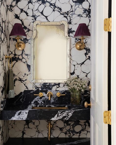 Our latest work: a formal powder bath that stops you in your tracks! Hand-marbled wallpaper by @ruleofthreestudio captivates alongside a… | Instagram Statement Half Bath, Dramatic Half Bath, Powder Bath Wallpaper Ideas, Maximalist Powder Room, Moody Powder Bath, Bold Wallpaper Bathroom, Black And White Marble Bathroom, Powder Bath Wallpaper, Freestanding Basin