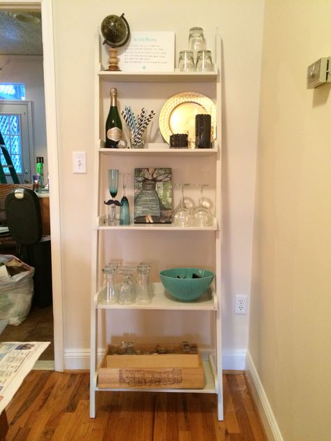 Ladder shelf bar area Ladder Shelf Kitchen Storage Ideas, Ladder Shelves Kitchen, Ladder Shelf Bar Cart, Ladder Shelf Bar Ideas, Ladder Shelf In Kitchen, Ladder Shelf Styling Kitchen, Ladder Shelf Decor Dining Room, Ladder Shelf Bar, Kitchen Ladder Shelves