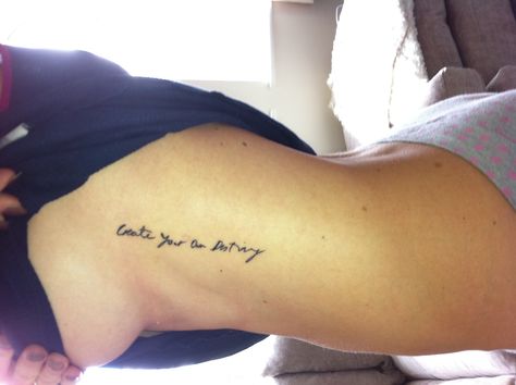 Written script tattoo create your own destiny :) one week old :) Thigh Tattoo Quotes, Font Tato, Tattoo Son, Cage Tattoos, Rib Tattoos For Women, Tattoos Infinity, Ribcage Tattoo, Writing Tattoos, Tattoo Script