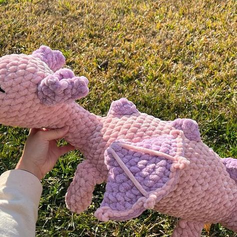 Genna Tatu on Instagram: "Another dragon completed! 🐉 Made this cutie for a very special friend of mine 💕 I saw a lot of you requested I make a neon dragon next so stay tuned!! Pattern: @lysenkocrochet Yarn: @premieryarns parfait xl Hook: 9mm #Handmade #amigurumi #yarnlove #crochet #cute #diy #handmadeplushies #crocheting #crochetdoll #amigurumidoll #kawaii #smallbusiness #strawberrycow #yarn #amigurumiaddict #plushies #squishmallows #chunkyyarn #amigurumilove #plushiesforsale #crochetpattern #amigurumitoy #crochetaddict #instacrochet #crochetlover #amigurumicrochet #michaelsyarn #plushiesofinstagram #reels #dragon" Jumbo Yarn Amigurumi, Crochet By Genna, Dino Plushie Crochet, Plushies Squishmallows, Neon Dragon, Crochet Dinosaurs, Crochet Dragon Pattern, Jumbo Yarn, Crochet Plushies