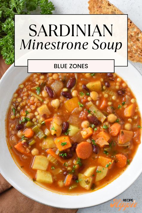 Sardinian minestrone soup gained popularity through the captivating Netflix documentary ‘Blue Zones’. This soup features a large variety of hearty and nutritious seasonal vegetables, beans, and spices, making it delicious and super healthy. It’s incredibly versatile, and in this specific Sardinian minestrone recipe, we save time and effort by using canned beans! If you're looking for healthy soup recipes, this is the best one! 3 Bean Minestrone Blue Zone, Blue Zones Sardinian Minestrone, Vegetable Soup Minestrone, Three Bean Minestrone Soup Blue Zone, Sardinian Longevity Minestrone, Minestrone Soup Blue Zone, Pasta House Minestrone Soup Recipe, Plant You Minestrone, Sardinian Minestrone Soup Blue Zone