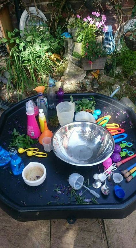 Potion making Potion Provocation, Potion Making Tuff Tray, Preschool Potion Making, Potion Making Eyfs, Eyfs Potions, Potion Station For Kids, Potion Making For Kids, Potion Station, Eyfs Outdoor Area