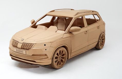 skoda's life-size cardboard car karoq replica is a kid's dream, by lazerian Cardboard Car, C 63 Amg, Wooden Toy Trucks, Designer Board, Wooden Toy Cars, Cardboard Toys, Paper Car, Cardboard Sculpture, Car Designs