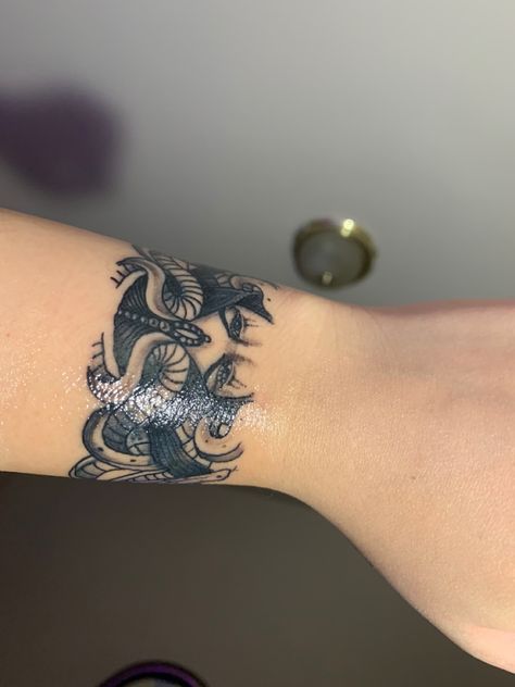 Medusa Tattoo Cover Up, Small Tattoo Cover Up Ideas Wrist, Medusa Band Tattoo, Medusa Tattoo Wrist, Wrist Tattoos For Women Cover Up Ideas, Name Tattoo Cover Up Ideas Wrist, Hand Cover Ups Tattoos, Wrap Around Wrist Tattoos Cover Up, Name Cover Up Tattoos For Women On Wrist