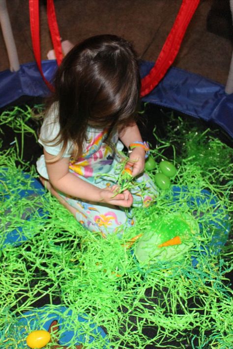 Doesn't everyone have a trampoline in their living room? Haha we had just gotten a new trampoline in the middle of winter. It was the perfect area for the Easter bunny to make a bunny den. Under the green easter grass were some chocolate carrots and well hidden green easter eggs. #easterideas #easterbasketideas #easterkids #easterkidsactivities #easterkidsideas #easterkidsbaskets Fun Easter Ideas, Chocolate Carrots, Easter Baskets For Toddlers, Easter Activities For Kids, Teen Bedroom Designs, Kids Easter Basket, The Easter Bunny, Holiday Planning, A Bunny