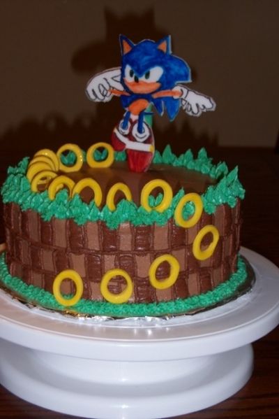 Sonic the Hedgehog Cake By jazminsweets on CakeCentral.com Sonic The Hedgehog Birthday Cake, Hedgehog Birthday Cake, Sonic Cakes, Sonic Birthday Cake, Sonic The Hedgehog Cake, Tails Sonic, Bike Cakes, Sonic Cake, Hedgehog Cake