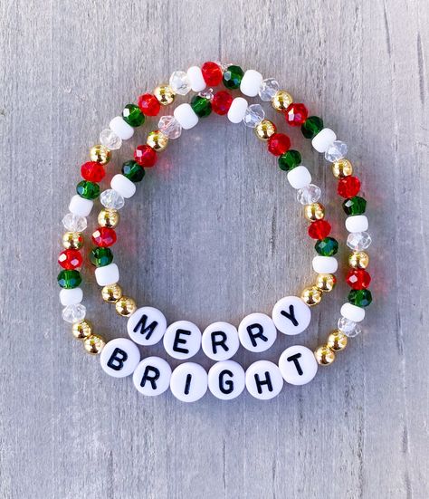 "Merry and Bright Mama & Mini Christmas Bracelet Set. Perfect for you and your little one to wear during the holidays!! ❄️❤️🎄 Crystal beads, seed beads and 18k gold ball beads with letter beads to spell out \"Merry\" & \"Bright\". Made with a clear elastic band. Words can be personalized to whatever you would like. * If you would like different words or a size that is not offered, please add in Personalization Section. CARING TIPS FOR YOUR JEWELRY ⭐️Treat and store with care. ⭐️ For longevity, avoid exposing your jewelry to water. ⭐️ Avoid having direct contact with lotions, perfumes, sanitizers as these chemicals may cause discoloration of your jewelry" Beaded Bracelets Sayings, Beaded Bracelets Seed Beads, Christmas Handmade Jewelry, Christmas Bracelet Ideas Glass Beads, Affordable Beaded Holiday Bracelets, Beaded Christmas Bracelets, Christmas Seed Bead Bracelets, Diy Christmas Jewelry Ideas, Christmas Friendship Bracelets