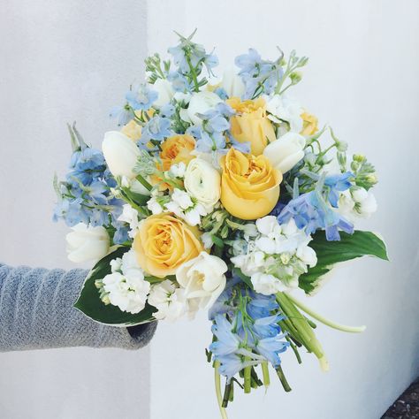 Beautiful blue and yellow Bridal Bouquet Blue White And Yellow Bouquets, White Yellow Blue Bouquet, Dusty Blue Yellow Wedding Theme, Light Blue Yellow And White Wedding, Blue And Yellow Flower Bouquets, Light Blue Yellow Wedding, Blue White Yellow Bridal Bouquet, Yellow Bridal Flowers, Blue And Yellow Bridal Bouquet