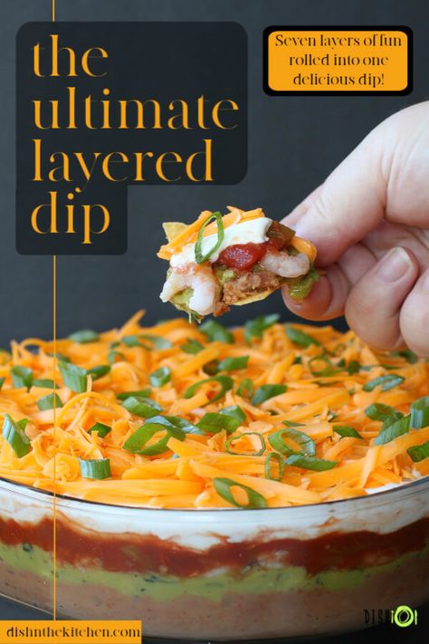 This classic 7 Layer Dip appetizer has all your favourite game day flavours all stacked up and ready for game day dipping action. #nachos #layereddip #dip #appetizer #7layerdip #guacamole #sourcream #cheese #refriedbeans #salsa Nacho Layer Dip, Layer Dip Recipe, 7 Layer Dip Recipe, Layered Dip, Layered Dip Recipes, 7 Layer Dip, Chili Lime Seasoning, Delicious Dips Recipes, Slow Cooker Meatballs