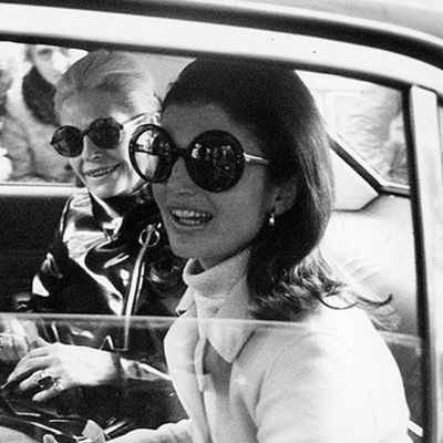 Get the Jackie Kennedy look from the 60's and 70's to block the haters. Learn about other sunglasses styles in different decades in our recent blog post.  #Sunglasses #Fashion #Style #Vintage #Round #Oversized #JackieKennedy #Women Jackie O Sunglasses, 60s Sunglasses, Jackie O's, Red And White Outfits, Sporty Sunglasses, Lulu Guinness, Metal Hinges, Americana Fashion, Jackie O