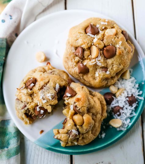 Milk Chocolate Chip Macadamia Nut Coconut Cookies. Thick soft and chewy bakery-style milk chocolate chip macadamia nut coconut cookies are an Island favorite! Macadamia Nut Cookies Recipe, Bakery Chocolate Chip Cookies, Modern Honey, Coconut Cookies Recipes, Coconut Chocolate Chip Cookies, Macadamia Cookies, Cookie Recipes Chewy, Macadamia Nut Cookies, Nut Cookies