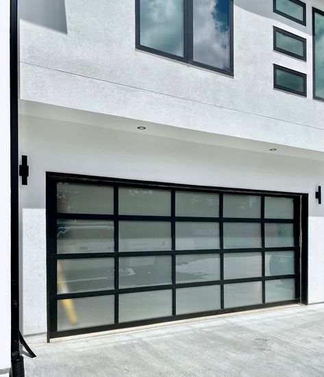 This full-view garage door with frosted windows is the PERFECT addition to this Buford home. #GlassGarageDoor #GarageDoorInstallation #NewDoor #ModernGarageDoor #AaronOverheadDoors #BufordGA Garage Door Frosted Windows, Frosted Garage Door, Frosted Glass Garage Door, Car Pavilion, Interior Garage Door, Garage Entry Door, Contemporary Garage Doors, Garage Door Windows, Mountain Home Exterior