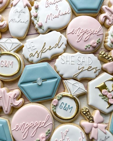 Emily’s Bake Shop on Instagram: “Still swooning over these engagement cookies 💍 next week I get to make more ring box cookies and I’m so excited to get back into my…” Engagement Cookies Simple, Custom Cookies Engagement, Engaged Cookies Decorated, Engagement Ring Decorated Cookies, Ring Cookies Engagement, Royal Icing Engagement Cookies, She Said Yes Cookies Decorated, Proposal Cookies Engagement, Engagement Party Cookies Simple