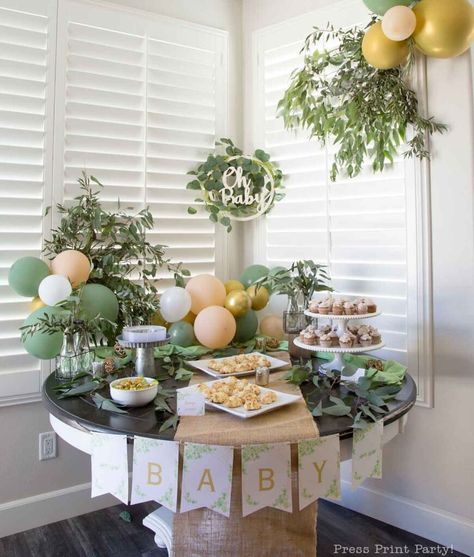 Greenery Baby Shower Decor Ideas with Eucalyptus and Printables - Get Inspired by this fun baby shower perfect for a boy or a girl or when you don't know the gender (gender neutral). Find the greenery baby shower invitation, the baby shower decorations, and where to get them as well as some fun baby shower activities that are not games. Plenty of eucalyptus baby shower decor for inspiration and how to do it. As well as tips on planning the best baby shower - Press Print Party! Baby Shower Home Decorations, Simple Woodland Baby Shower Ideas, Simple Outdoor Baby Shower Ideas, Greenery Shower Decor, Indoor Baby Shower Decor, Baby Shower Game Table, Oh Baby Shower Ideas Boy, Simple Baby Shower Table, Olive Theme Baby Shower Ideas