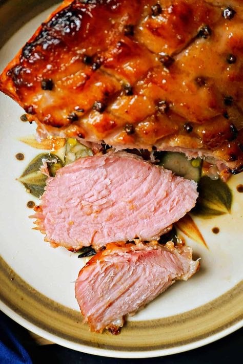 Glazed Ham with Marmalade and Mustard, a must-try recipe for your festive dinner. Moist cooked ham coated in a wonderfully spiced marmalade and mustard glaze with whole cloves pressed into the ham, it really can't get any more delicious than this! Marmalade Ham Glaze, Mustard Ham Glaze, Gammon Recipes, Holiday Ham Recipes, Cooked Ham, Ham Glaze Recipe, Marmalade Recipe, Leftover Ham Recipes, Glazed Ham