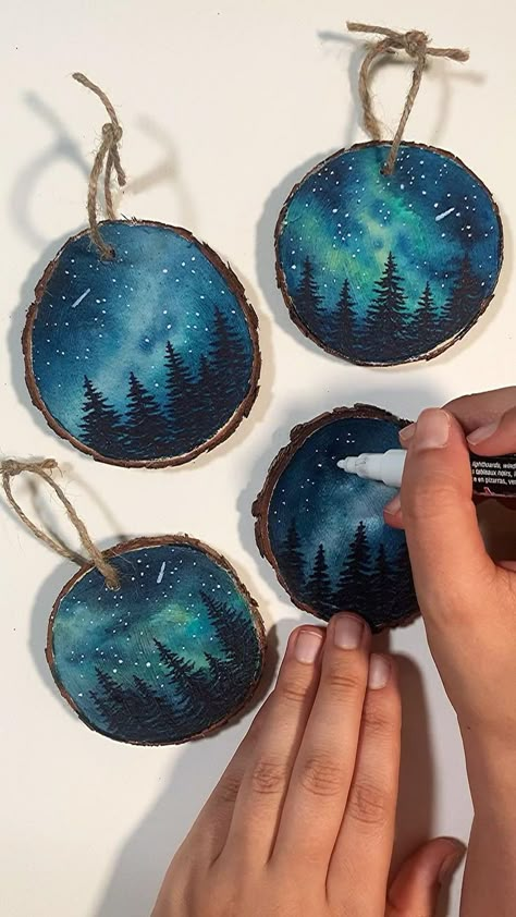 DIY Wood Slice Ornaments - Watercolor Galaxy | Diy christmas ornaments, Christmas ornament crafts, Christmas crafts Diy Wood Slice Ornaments, Wood Slice Ornaments, Watercolor Galaxy, Ideas Minecraft, Wood Slice Ornament, Stovetop Potpourri, Orange Garland, Wood Christmas Ornaments, Elf On The Shelf Ideas