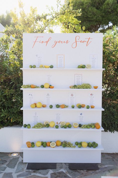 A Vibrant Wedding Table Seating Chart Aesthetic Wedding Seating Chart, Fruit Seating Chart, Food Seating Chart Wedding, Italian Seating Chart, Citrus Seating Chart, Lemon Seating Chart, Wedding Table Fruit, Limoncello Seating Chart, Orange Seating Chart