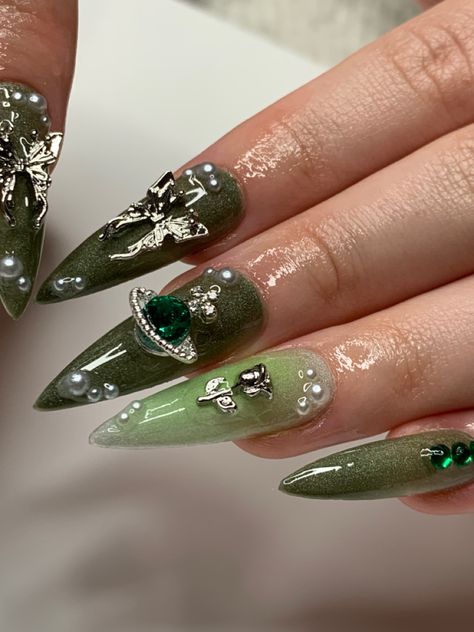 #nails #nailsofinstagram #nailart #trending #trendingnails #green #greennails Green Stiletto Acrylic Nails, Green Nails Bling, Dark Green Prom Nails, Silver And Green Nails, Green Stiletto Nails, Green Prom Nails, Slytherin Nails, Mom Nails, Bday Nails