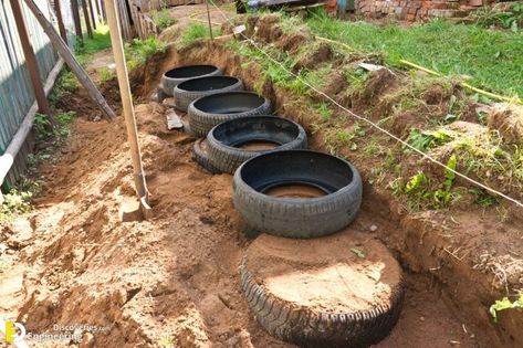 Brilliant Way To Reuse And Recycle Old Tires | Engineering Discoveries Recycled Tyres Garden, Driveway Culvert, Cheap Retaining Wall, Upcycle Tires, Deck Foundation, Tire Garden, Garden Retaining Wall, How To Waterproof Wood, Reuse And Recycle