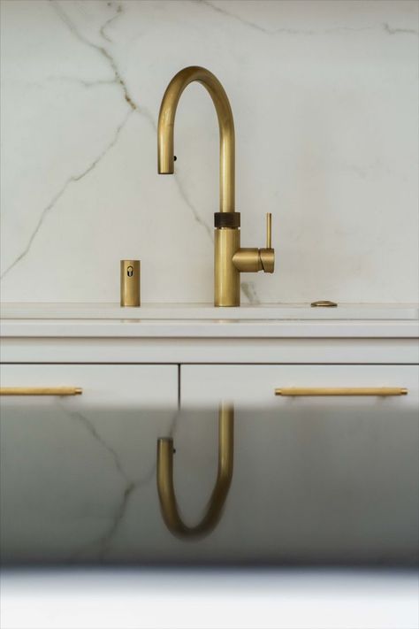 A custom brass Quooker tap sat within a white quartz worktop with prominent veins running throughout. Quooker Tap, Traditional Kitchen, Cabinet Makers, Custom Metal, Kitchen Inspirations, Brass Finish, Tap, Wall Lights, Twist