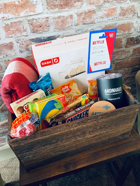 Netflix Gift Basket, Netflix And Chill Gift Basket Ideas, Movie Night Basket Ideas Silent Auction, Movie Themed Gift Basket, Popcorn Gift Basket Christmas, Popcorn Maker Gift Basket, Movie Popcorn Gift Basket, Family Movie Night Gift Basket, Family Game Night Gift Basket With Popcorn