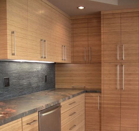 Bamboo Kitchen Cabinets, Slab Cabinets, Leather Barstools, Metal And Ceramic, Bamboo Cabinets, Bamboo Kitchen, Soapstone Countertops, Bamboo Panels, Island Countertops