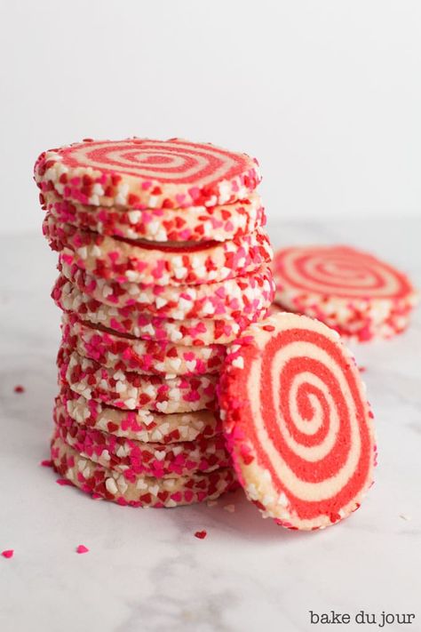 Feast your eyes on these Valentine's Day Pinwheel Cookies! The best part about this recipe? You can adapt this to any occasion and holiday! #valentinesdaybaking #pinwheelcookies #sugarcookies | bakedujour.com Pinwheel Cookies Recipe, Valentines Day Cookie Recipe, Swirl Cookies, Super Easy Desserts, Pinwheel Cookies, Valentines Day Desserts, Valentine Cake, Sugar Cookie Dough, Valentine Chocolate